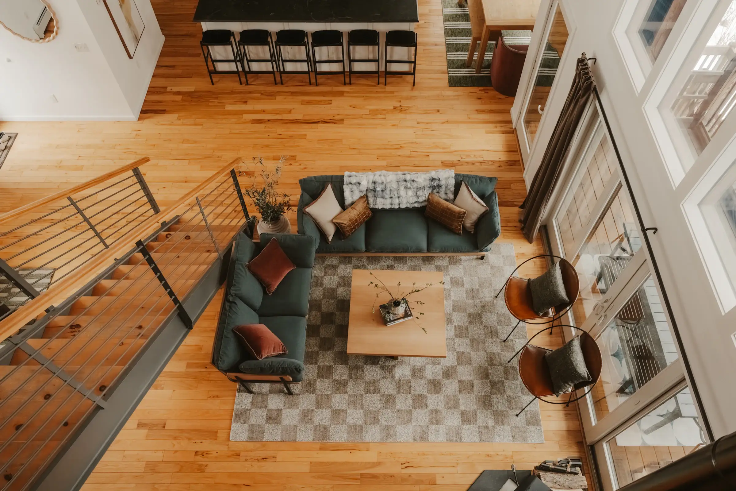 Warm plank flooring across an open Fort Wayne living room